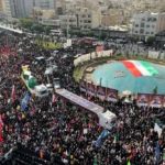 Iran Holds Massive State Funeral For 60 War Dead As Trump Threatens More Strikes